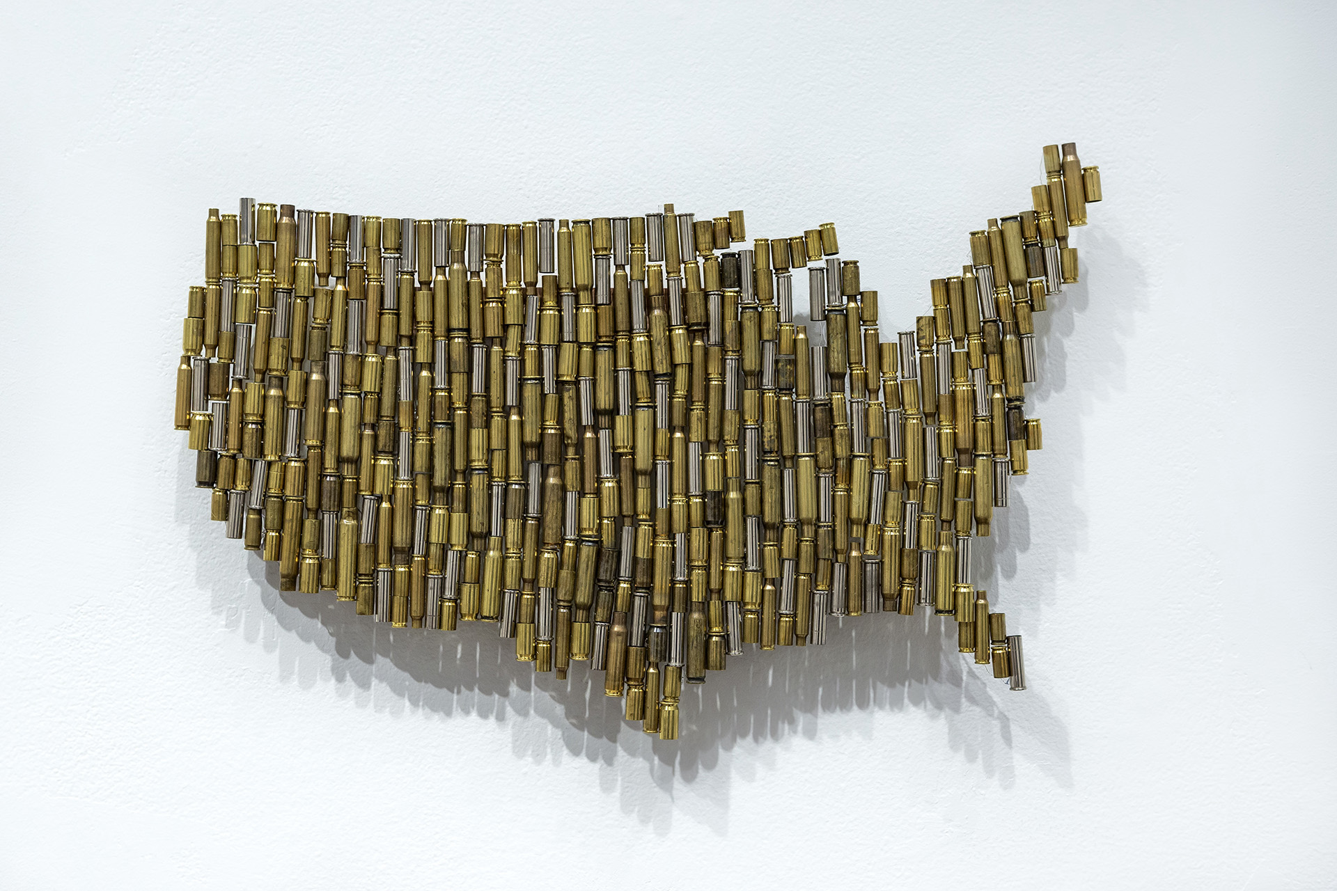Artwork depicting the United States made of bullet casings