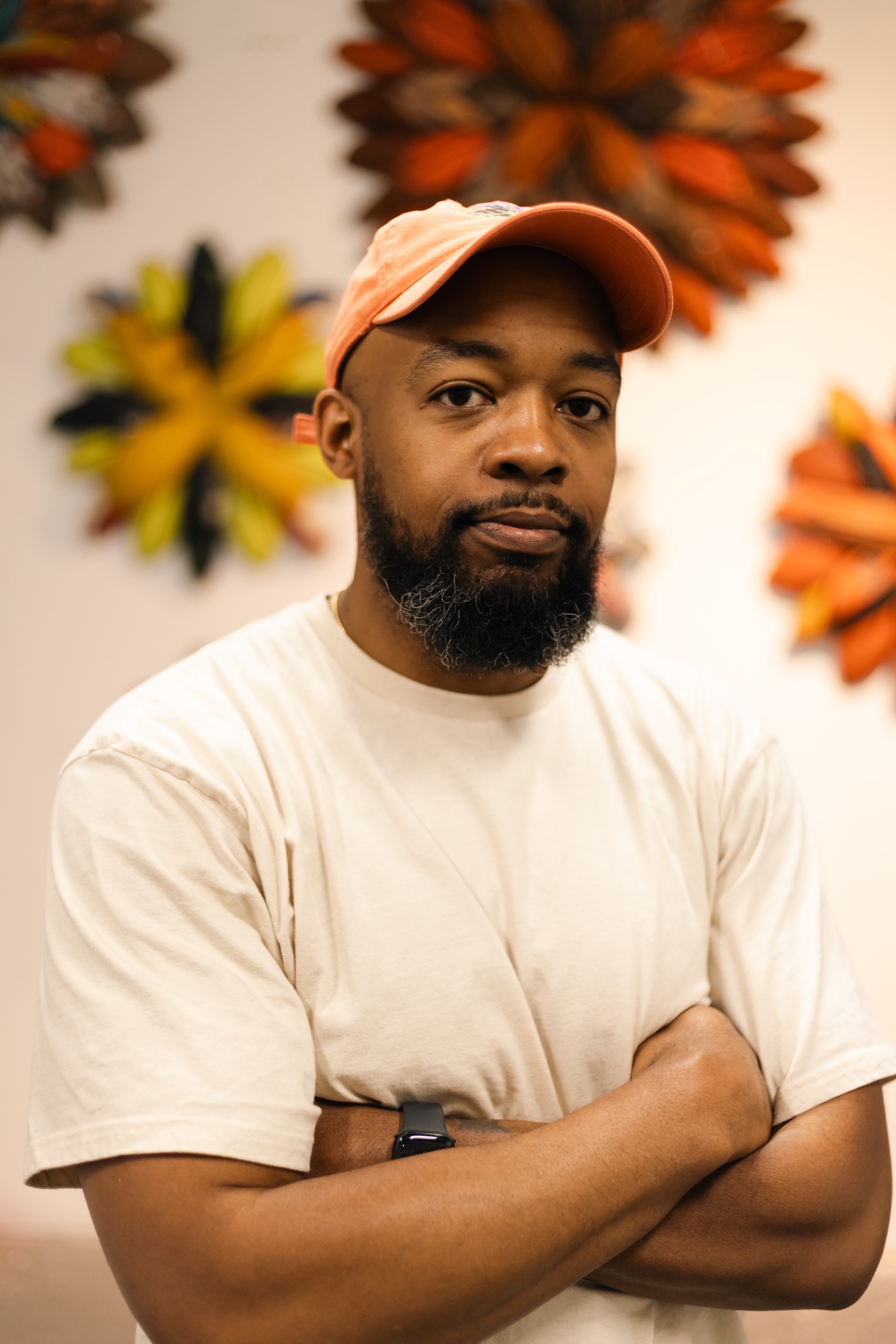 Brandon Donahue standing with arms crossed