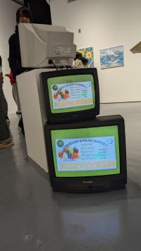 Image of artwork on three old computers