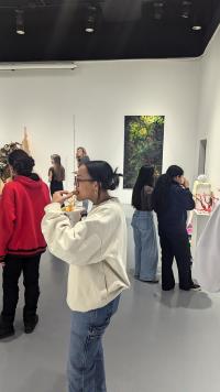 Image of students looking at artworks