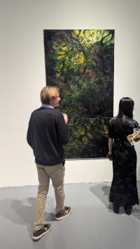 Image of students looking at artworks