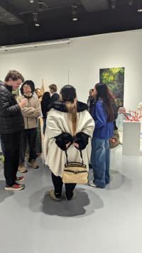 Image of students looking at artworks