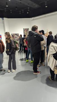 Image of students looking at artworks