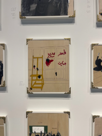 Picture of artworks hanging on the wall, depicting a classroom
