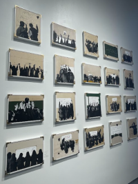 Picture of artworks hanging on the wall, depicting a classroom