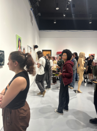 Picture of people looking at artworks