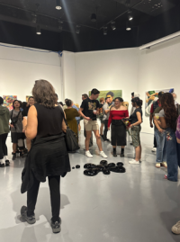 Picture of people looking at artworks