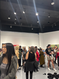 Picture of people looking at artworks