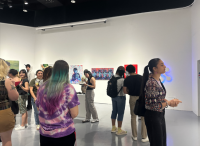 Picture of people looking at artworks